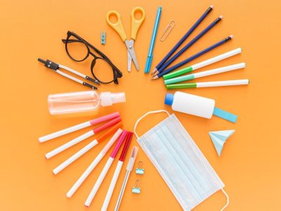 top-view-school-supplies-with-face-mask-pencils_23-2148575188